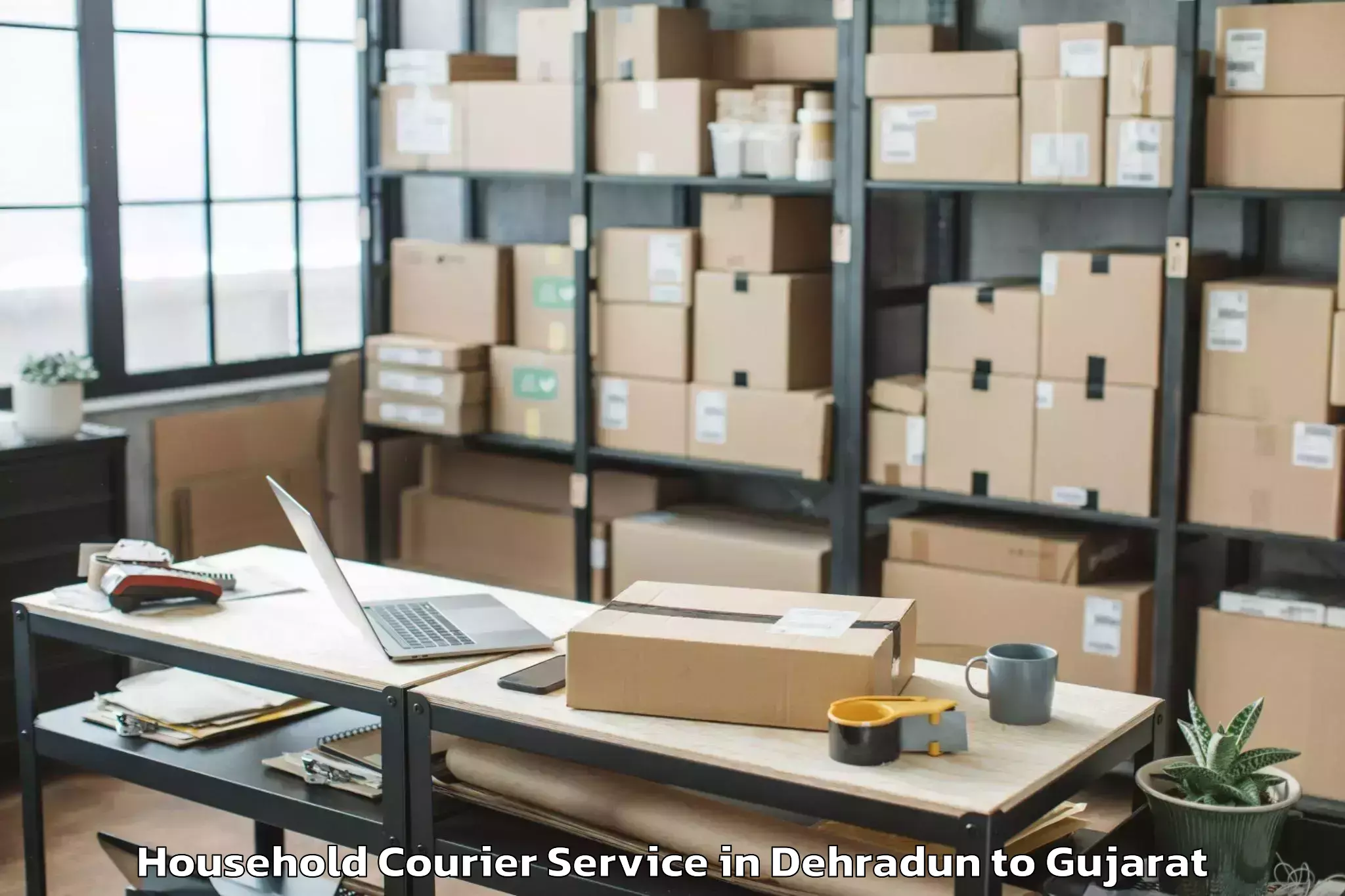 Reliable Dehradun to Hazira Household Courier